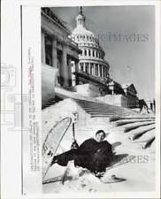 1973 Press Photo Rep. Don Young frolics in snow outside the Capitol, Washington picture