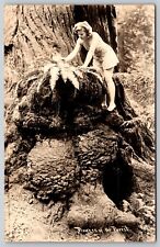 RPPC Barefoot Girl Looks at Forest Fern on Base of Large Tree - Photo Postcard picture