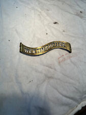 Westinghouse stamped thru cage badge picture