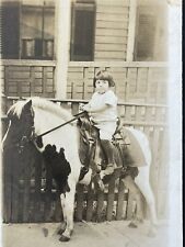 Snapshot Of A Young Girl Riding A Pony. Horse / Pony Interest picture
