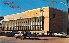Nogales Mexico~Government Hospital~Man on Motorcycle Passes Station Wagon~1971 picture