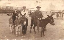 RIDING DONKEY / MULE / BURRO real photo postcard rppc CIRCUS OR FAIR c1910 picture