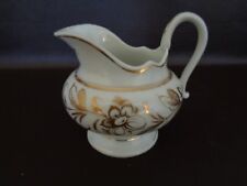 Vintage White Ceramic Creamer With Gold Floral Pattern  picture