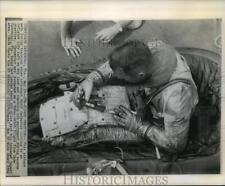 1962 Press Photo Astronaut Scott Carpenter Checking Equipment During Training picture