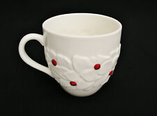 2004 STARBUCKS 16 OZ. COFFEE MUG - WHITE EMBOSSED HOLLY w/ RED BERRIES picture