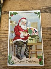 Antique Vintage Christmas Postcard Red Santa Paints Toy House Workshop Pipe picture