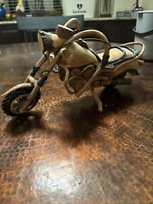 Vintage handcrafted wooden motorcycle picture
