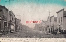 1914 ARCADIA WI East on Main Street, dirt road, mailed to Miss Olga Neggle picture