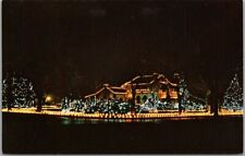 c1960s New Mexico CHRISTMAS Greetings Postcard LUMINARIAS Street Scene / Night picture