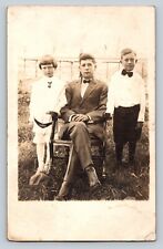 RPPC Young Man & Children Classic Fashion ANTIQUE Postcard AZO 1904-1919 picture