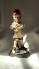 Vintage Saxophone Player Hobo Boy Figurine Resin-Plaster & Wood Base Dated 1985. picture