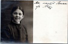postcard rppc - Brown-haired girl in black dress - K Ltd.  1918-1936 picture