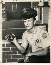 1968 Press Photo Harbor Patrolman C. J. brushed hand over soot-coated porch picture