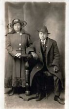 Couple Wearing Overcoats And Hats Real Photo Postcard rppc picture