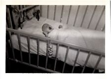 Upset Baby Crying in Her Crib Wailing Infant 1950s Vintage Found Photo picture