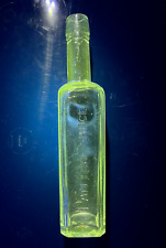 Antique manganese glass bottle Pan Yan Sauce glows under UV  light picture