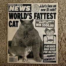 May 10, 2004 Weekly World News: 80lb FATTEST CAT - 2HEADED MAN - JLO COIN picture