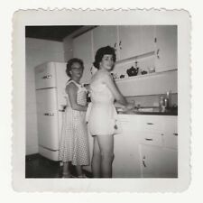 Two Women Looking Over Shoulder Washing Dishes Vintage Kitchen Interior Photo picture