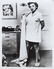 A Star is Born 1954 8x10 inch photo Judy Garland puts on her pajamas & robe picture