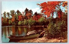 Greetings from Winchester NH 1956 Postcard Autumn Lake Scene Row Boat Quiet Spot picture