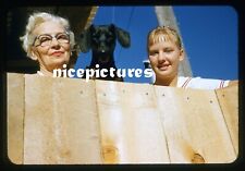 Beautiful Women Photo op with cute Doggie behind fence - 1950s Kodachrome slide picture