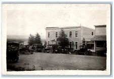 Encampment Wyoming WY Postcard RPPC Photo Hotel Inn Building Cars Scene c1910's picture