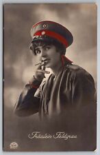 RPPC World War 1 era Fraulein Feldgrau beautiful woman uniform smoking postcard picture
