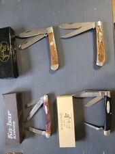 Four pocket knives picture