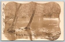 RPPC Canby  Minnesota  Man on Boat Canby Creek  Real Photo Postcard  1907 picture