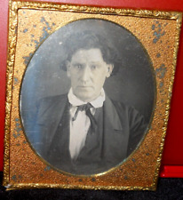 1/6th size Daguerreotype of younger man in brass mat/frame picture