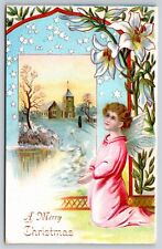 Christmas~Cupid Kneeling White Flowers Christmas Greeting~Vintage Postcard picture