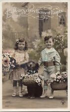 RPPC Adorable Children Boy Girl With Puppy Dog Floral Arrangement Photo Postcard picture