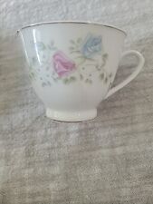 Vintage Tea Cup and Saucer Fine Porcelain Made In China  - Rose Pattern picture