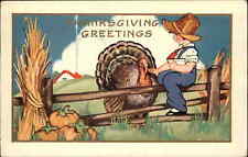 Whitney Thanksgiving Little Boy Farmer Feeds Turkey Vintage Postcard picture