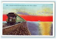 c1910s Overland Limited Locomotive Crossing Lucin Cut-Off at Sunset Postcard picture