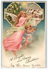 c1910's Christmas Tree Floating Angels Flute House Church Winter Tuck's Postcard picture