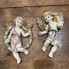 Pair of Winged Angel Cherubs Wall Plaques Figures Resin Floral Wreath and Fruit picture