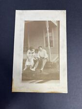 RPPC Family Sitting On Porch In Front Of Their House Mom Talking To Her Daughter picture