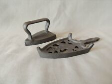 Collectible decorative miniature metal iron in a metal base picture