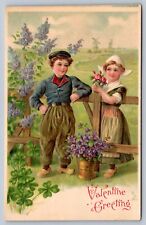 c1910 Valentines postcard cute DUTCH couple at gate  GERMAN EMBOSSED #1 picture