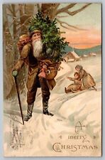 Postcard Merry Christmas Brown Robe Santa Carrying Tree Children Sledding Snow picture