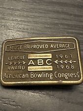 Tiny Gold Tone Most Improved  Average Bowling Belt Buckle Roughly 2 In x 1.25in picture