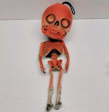Vintage Spooky Orange Skeleton Hanging Rubber Paper Magic Group Halloween Decor picture