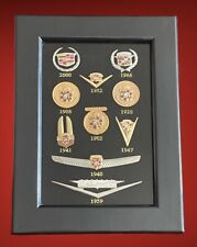 GM Licensed Framed Collection Of 10 Cadillac Enamel Emblem Lapel Pins 1902-2000 picture