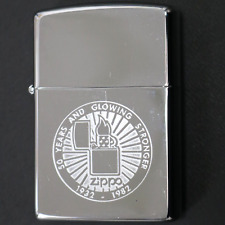 Vintage 1992 Unfired Zippo Lighter Glowing Stronger 50th Anniv. 1932 - 1982 picture