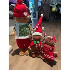 lot of three Christmas gingerbread man figures picture