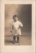 1910s European RPPC Photo Postcard Little Boy with Bamboo Cane / Studio Portrait picture