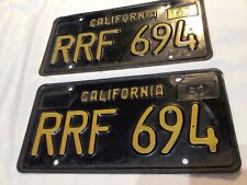 Vintage SET x2 1963 CALIFORNIA LICENSE PLATES # RRF 694 Black & yellow w/ 66 Tag picture