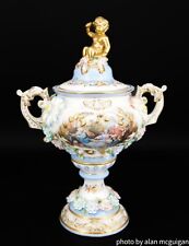 Dresden Porcelain  Vase Topped With  Gold Gilded Cherub And A Floral Design picture