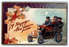 1910 New Year Car Driving Holly Berries Embossed Tuck's Waterbury CT Postcard picture